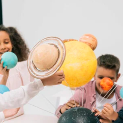 A picture of students working on a science project.