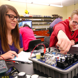 A picture of students working in tech lab
